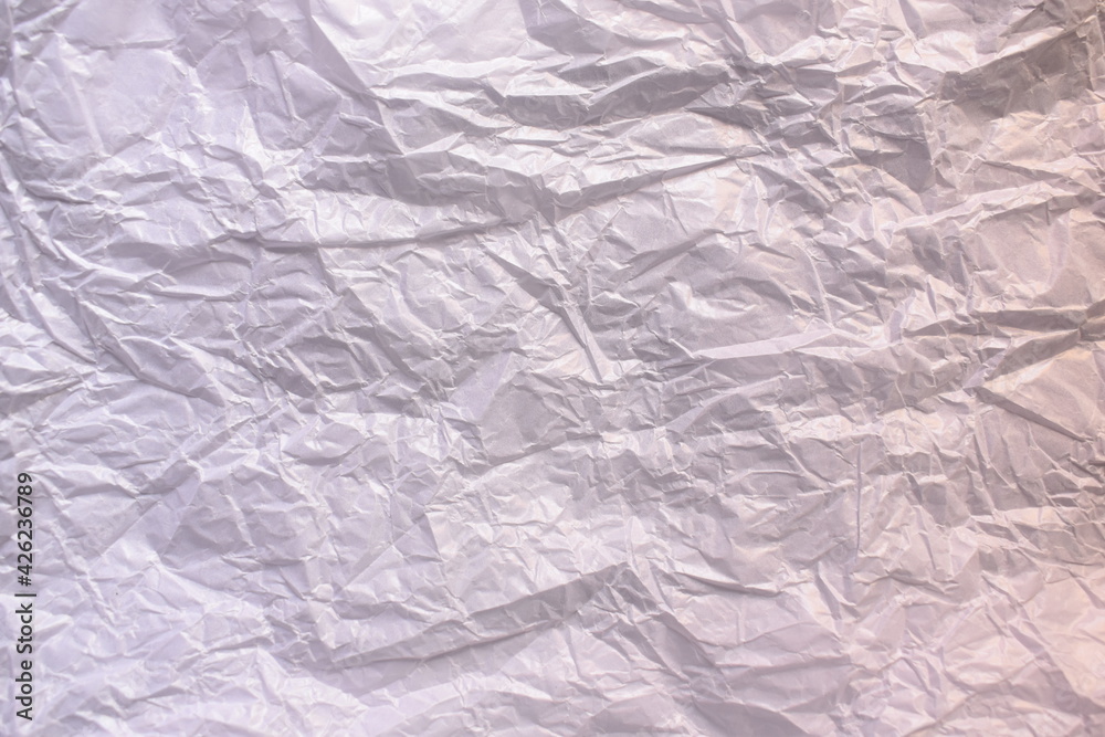 White color crumpled baking parchment paper textured background