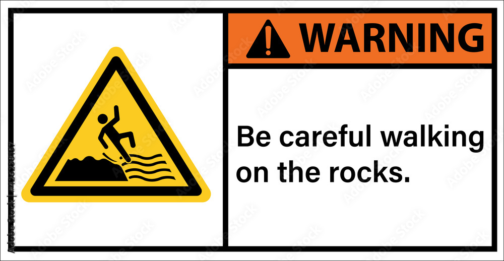 Please be careful walking on rocks.,Warning sign Please be careful walking on rocks.,Warning sign