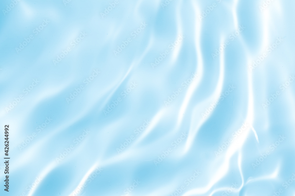 Obraz premium 水が揺らぐ様子。水面の背景素材。水のテクスチャ・イメージ。 