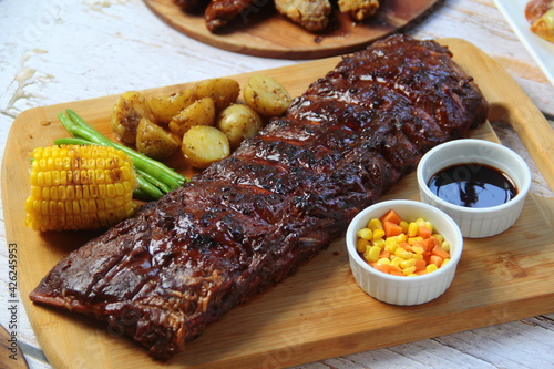 Freshly cooked pork baby back ribs photo