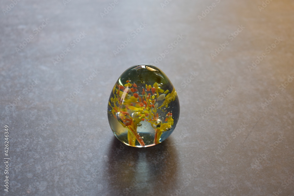 Translucent small glass paperweight isolated Translucent small glass paperweight isolated