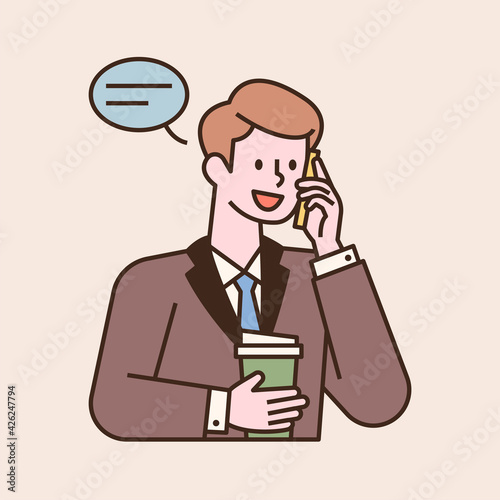 A businessman in a suit is on the phone and holding a coffee in one hand. flat design style minimal vector illustration.