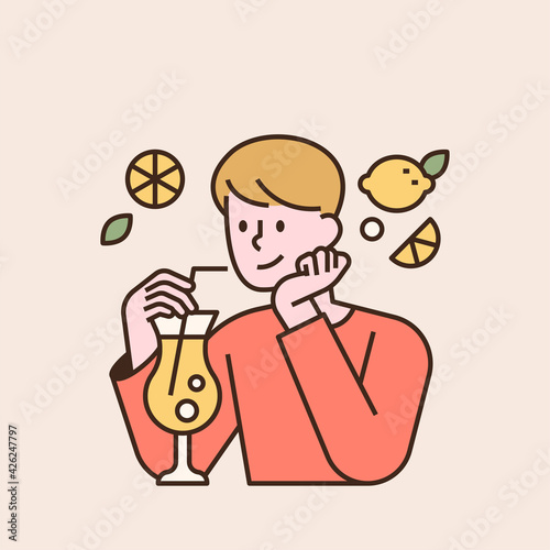 A boy is drinking lemonade. flat design style minimal vector illustration.