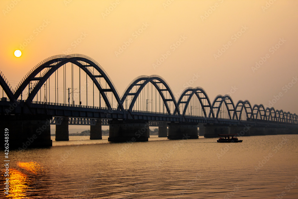 The Godavari Arch Bridge is a bowstring-girder bridge that spans the Godavari River in Rajahmundry, India. It is the latest of the three bridges that span the Godavari river at Rajahmundry. 