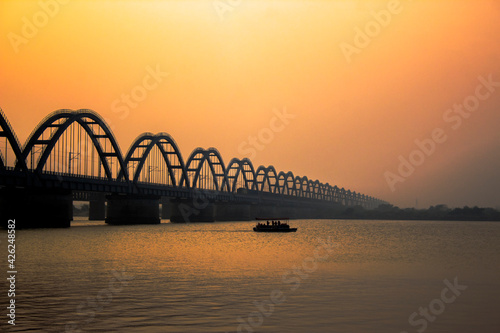 The Godavari Arch Bridge is a bowstring-girder bridge that spans the Godavari River in Rajahmundry, India. It is the latest of the three bridges that span the Godavari river at Rajahmundry. 