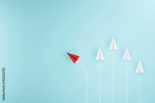 Group of paper plane in one direction and with one individual pointing in the different way. Business concept for new ideas creativity and innovative. 3d illustration