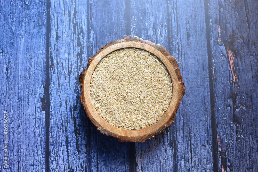 Raw whole dried brown color rice Raw whole dried brown color rice