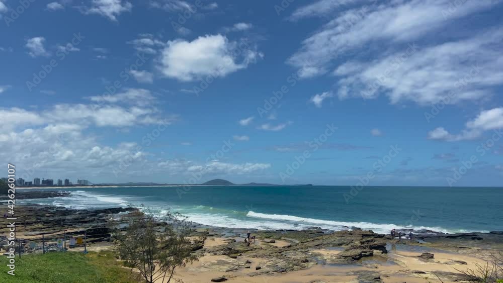 Beautiful wide shot looking up the Queensland coast from Caloundra, North over the rocky shoreline towards Mount Coolum Beautiful wide shot looking up the Queensland coast from Caloundra, North over the rocky shoreline towards Mount Coolum