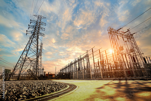 High voltage electric power station,substation with transformers and sky background.high voltage post,High voltage tower sky sunset photo