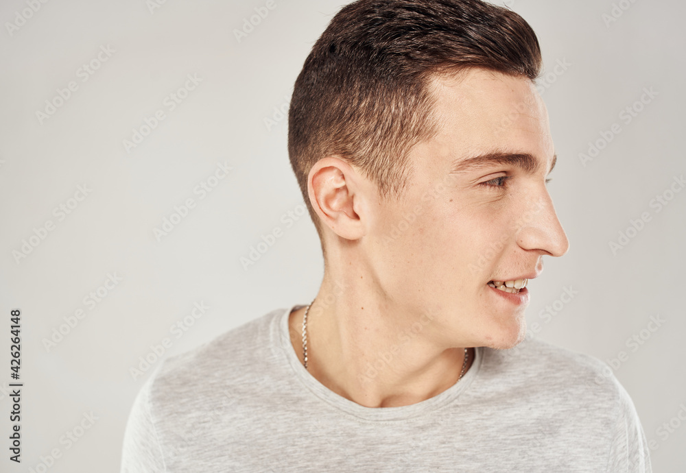 handsome man fun in white t-shirt close-up emotions handsome man fun in white t-shirt close-up emotions