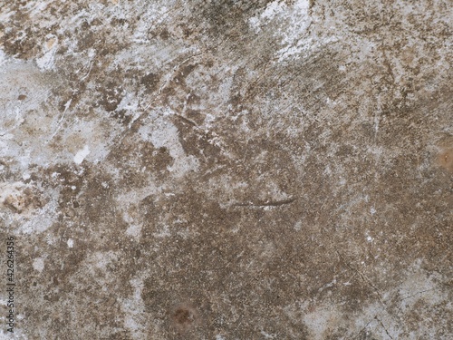 Old cement or concrete outdoor wall with stains and moldy for background.There are black and stains.
