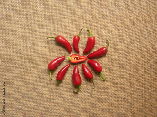 Cut red ripe fresh Fresno chili pepper photo