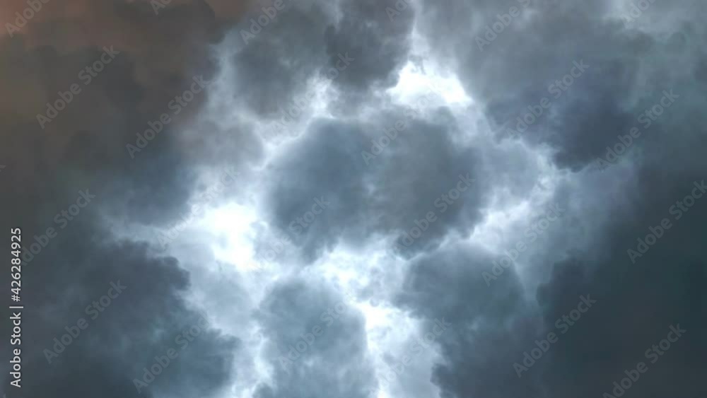 moving dark cumulonimbus clouds with flashes of lightning in them, point of view of thunderstorms.