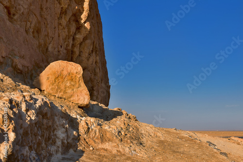 a fragment of a mountain illuminated by the sun