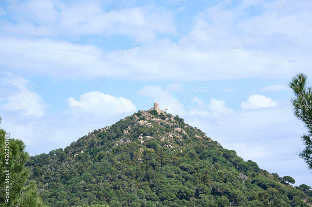 Landscape with a castle on top of a mountain Landscape with a castle on top of a mountain