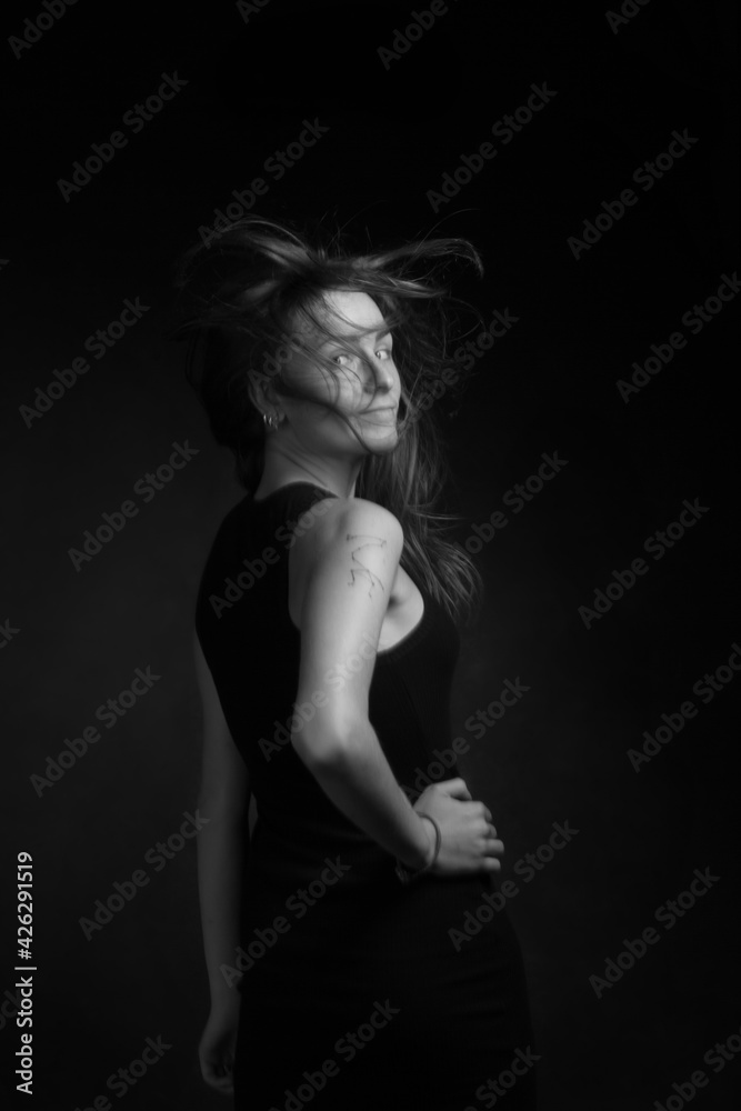 Black and white portrait of a young girl with long hair Black and white portrait of a young girl with long hair