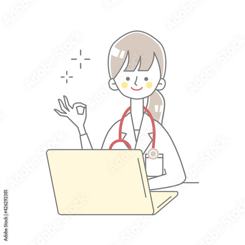 パソコンの前でOKサインをする医者のイラスト