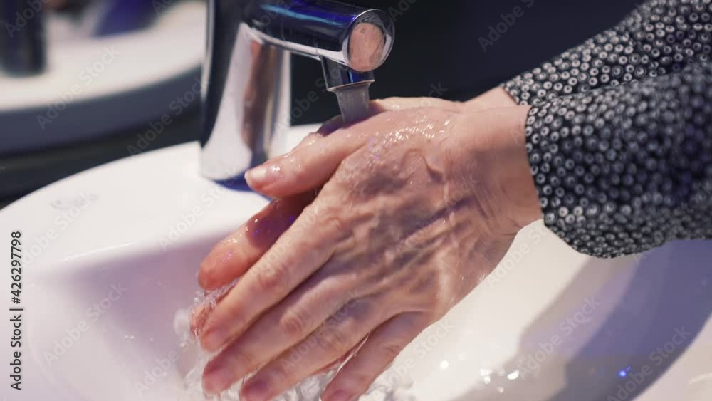 Prevention of coronavirus pandemic. Washing hands with soap. Prevention