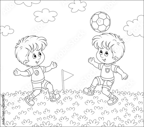 Little football players with a ball at a match or training on a sports field on a summer day, black and white outline vector cartoon illustration for a coloring book page