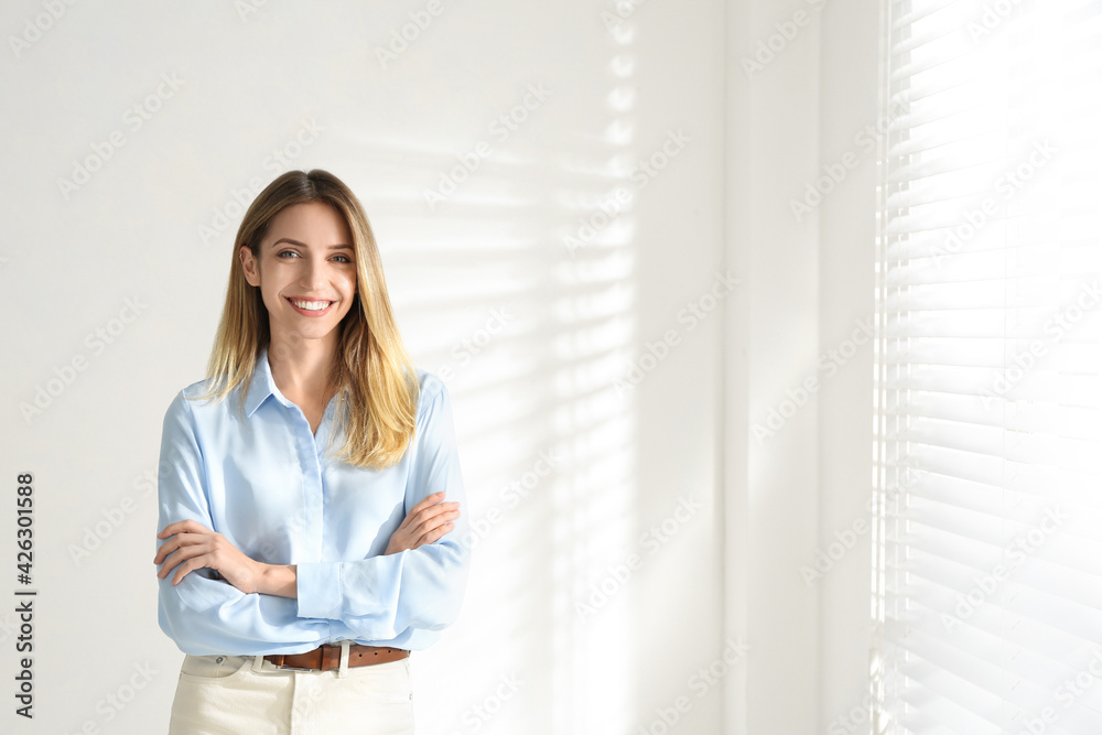 Portrait of beautiful young businesswoman in office Portrait of beautiful young businesswoman in office