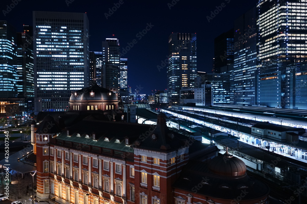 Tokyo Station and skyscraper at night in Tokyo, Japan - 東京駅 夜景 日本 Tokyo Station and skyscraper at night in Tokyo, Japan - 東京駅 夜景 日本