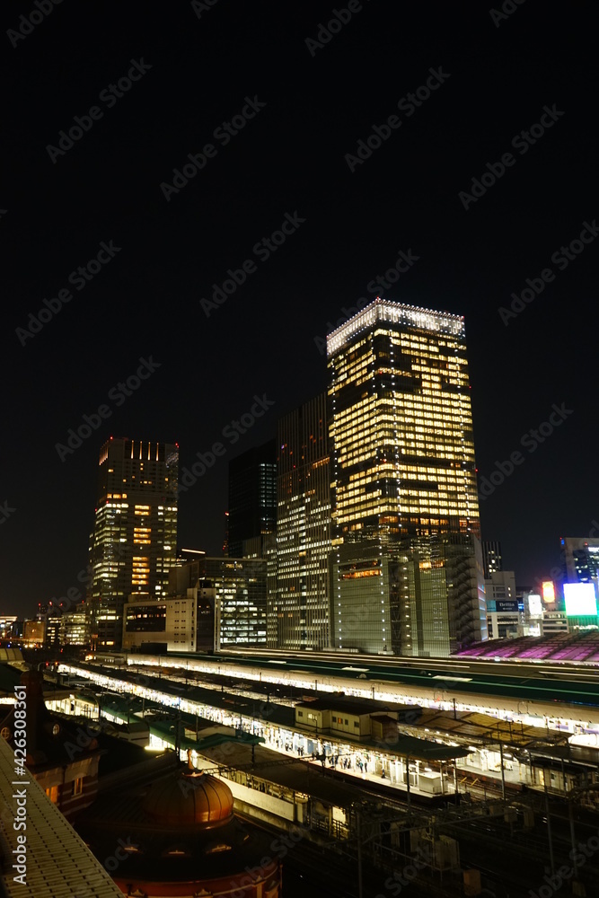 Tokyo Station and skyscraper at night in Tokyo, Japan - 東京駅 夜景 日本