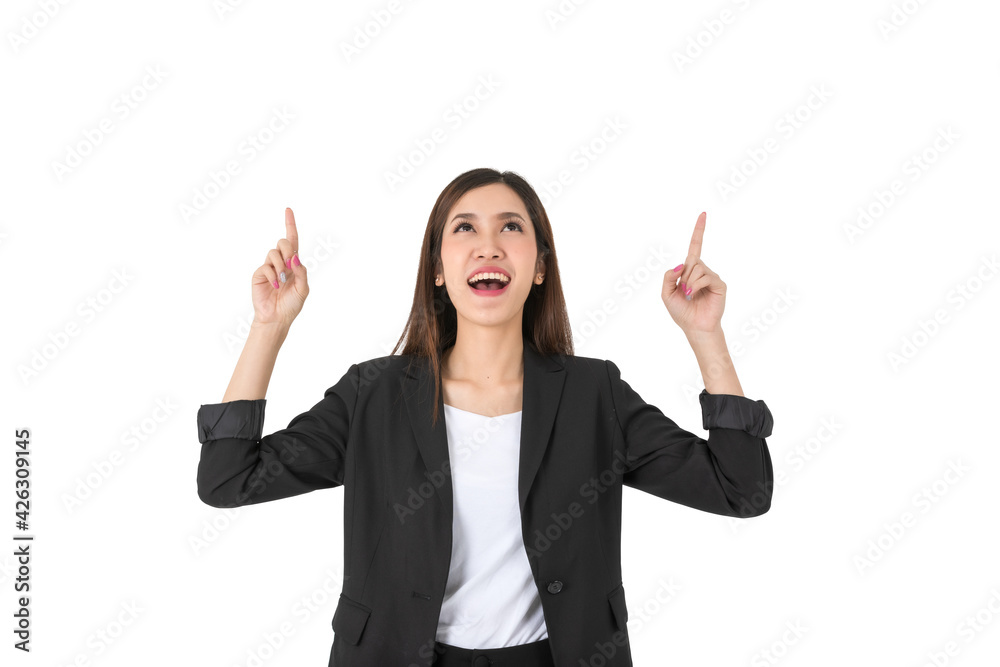 Close up Asian young long brown hair successful beautiful female businesswoman wears black formal suit hold two hands up use index finger point and look up smiling to sky in front of white background Close up Asian young long brown hair successful beautiful female businesswoman wears black formal suit hold two hands up use index finger point and look up smiling to sky in front of white background