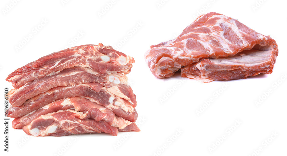 Sliced raw pork ribs are isolated on a white background.a set of two images . Sliced raw pork ribs are isolated on a white background.a set of two images .