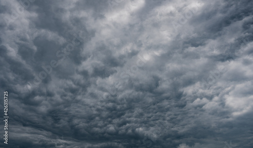 Fototapeta Naklejka Na Ścianę i Meble -  Dark grey storm clouds background. View of Rain clouds in sky.
