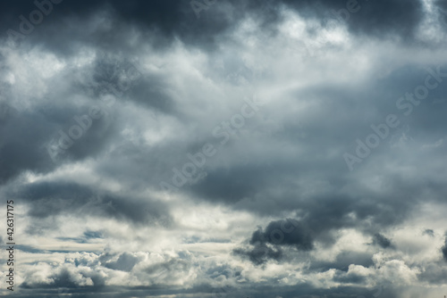 Dark grey storm clouds background. View of Rain clouds in sky.