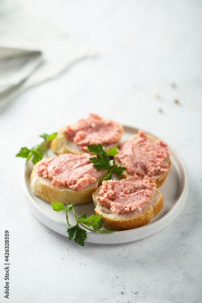 Traditional German pork pate on a white bread