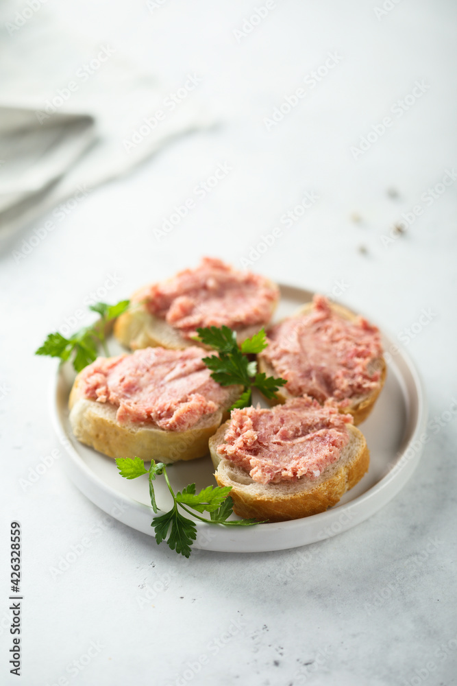 Traditional German pork pate on a white bread Traditional German pork pate on a white bread