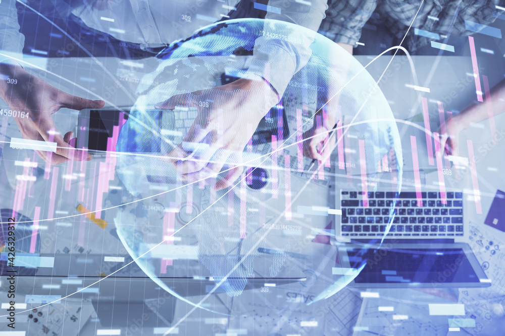 Double exposure of man and woman working together and financial chart hologram drawing. market analysis concept. Computer background. Top View. Double exposure of man and woman working together and financial chart hologram drawing. market analysis concept. Computer background. Top View.