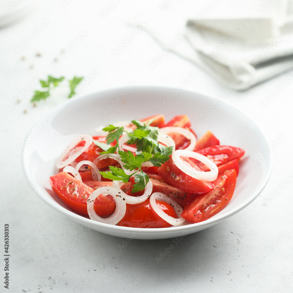 Healthy tomato salad with onion Healthy tomato salad with onion