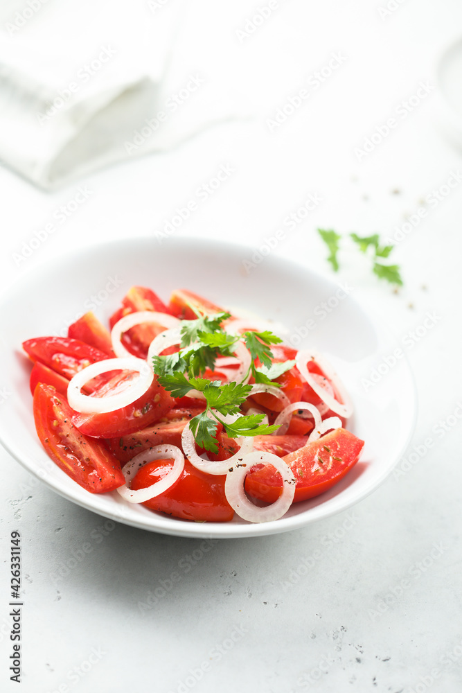 Healthy tomato salad with onion Healthy tomato salad with onion