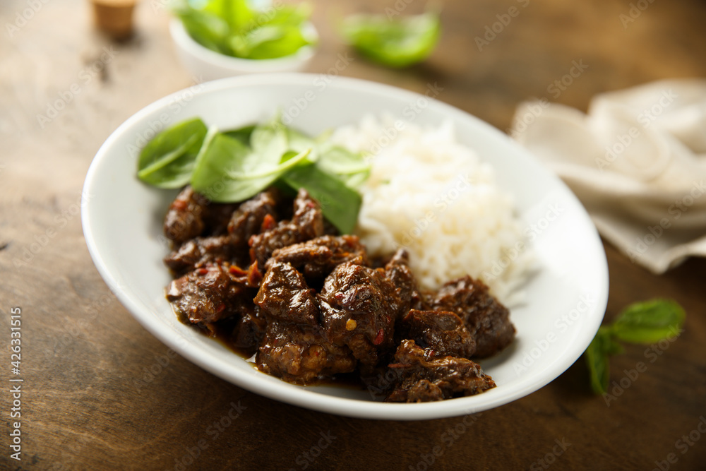 Homemade beef ragout with spinach and rice Homemade beef ragout with spinach and rice