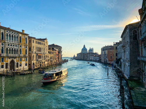 View of a vaporetto on the Grand Canal and Basilica Santa Maria della Salute from the Ponte dell'Accademia in Venice, Italy