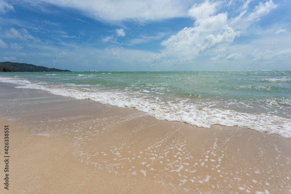 Sea view from tropical beach with sunny sky. Summer paradise beach of Koh Samui island. Tropical shore. Tropical sea in Thailand.