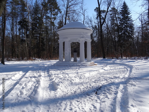 Temple of Eugen in park in Pokoj in Poland covered by snow. photo