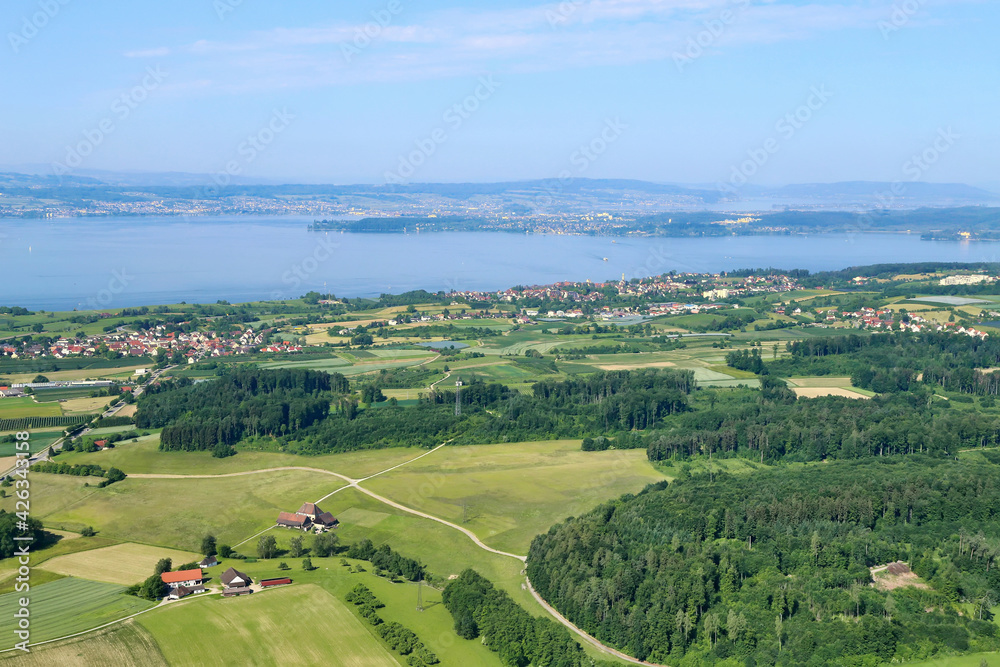Aerial landscape with Boden lake. Towns Stetten, Meersburg and Konstanz are visible. Two ferries are sailing across the lake