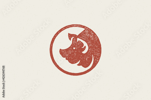 Pig head silhouette for meat industry hand drawn stamp effect vector illustration.