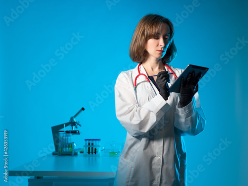 Female doctor with a tablet...