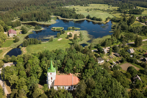 Aerial view of Zlekas village and lutheran church, Latvia. © Bargais