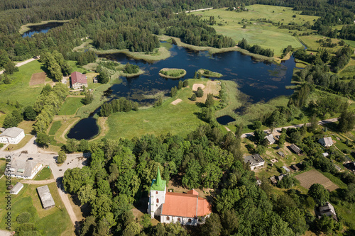 Aerial view of Zlekas village and lutheran church, Latvia.