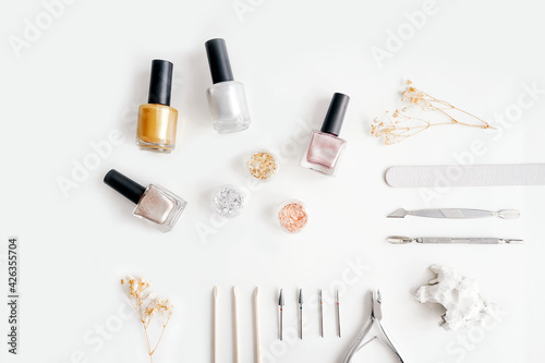 Tools of manicure set on white background.