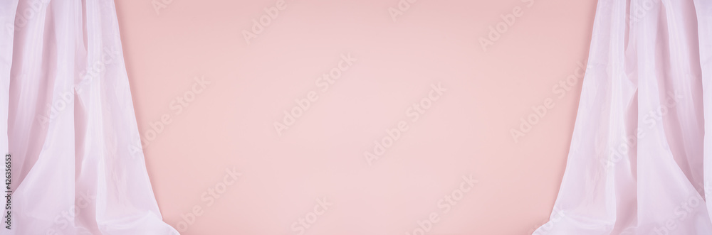 Modern simple gallery or scene with flow folded silk curtain on pastel pink wall, web banner. Mock up for display and portfolio. Modern simple gallery or scene with flow folded silk curtain on pastel pink wall, web banner. Mock up for display and portfolio.