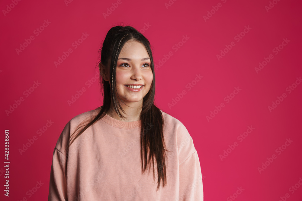 Asian brunette happy woman smiling and looking aside Asian brunette happy woman smiling and looking aside