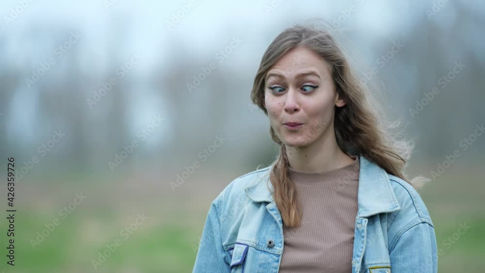[4k] young blonde woman making funny face