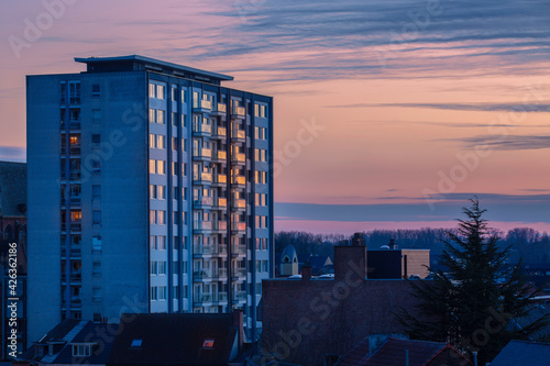 sunset over the apartment building