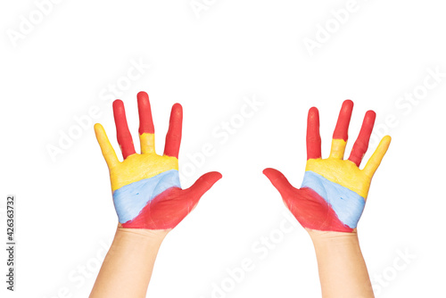 human hands in colorful paint